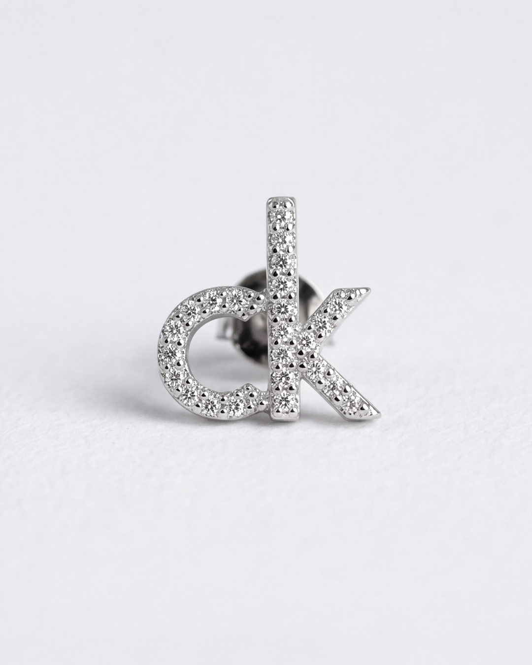 CK Signature Stud Earrings