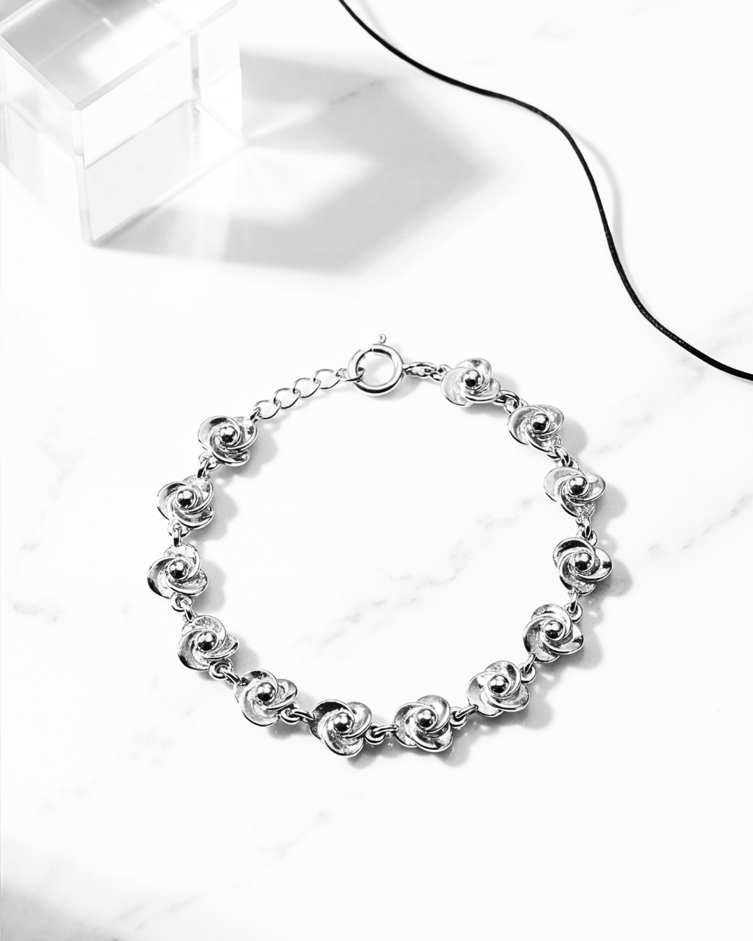 Swirl Link Silver Bracelet
