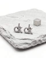 CK Signature Stud Earrings