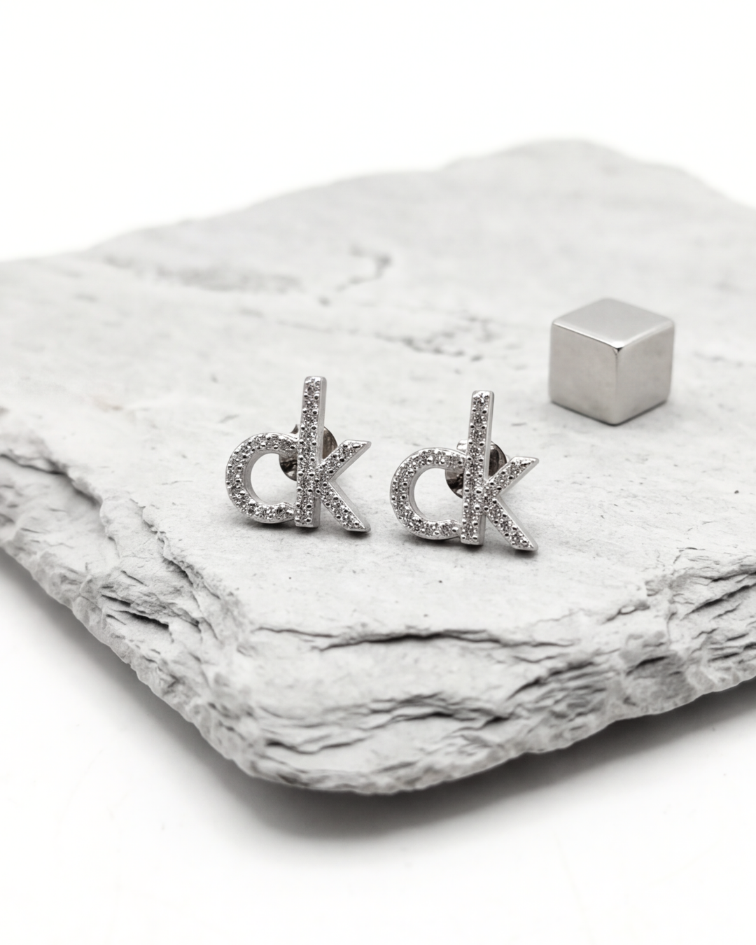 CK Signature Stud Earrings