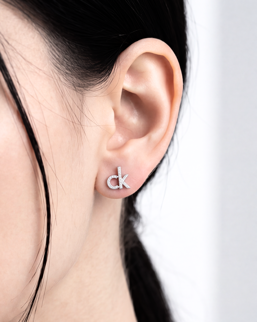 CK Signature Stud Earrings
