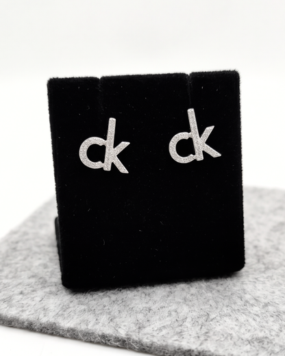 CK Signature Stud Earrings
