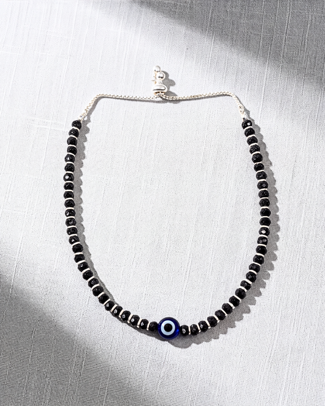 Eklavya Evil Eye Black Nazaria Anklet — catalog image 2